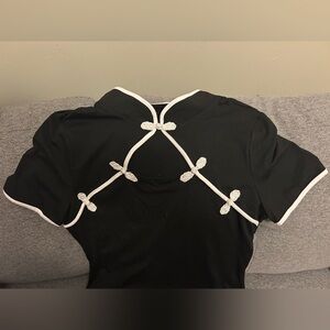 Elegant black dress with White Accents